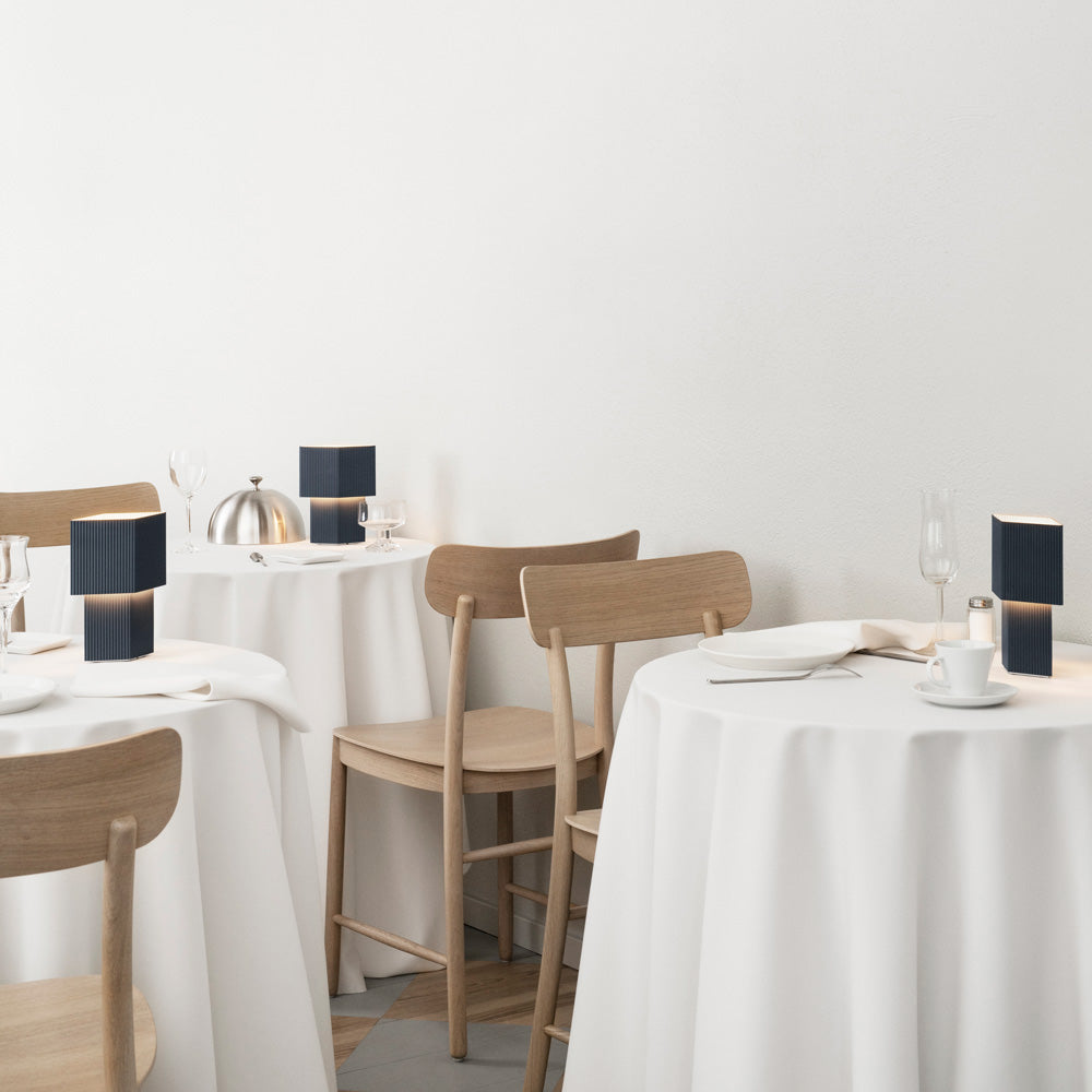 Romb Mini LED Rechargeable Table Lamp in restaurant.