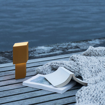 Romb Mini LED Rechargeable Table Lamp in Outside Area.