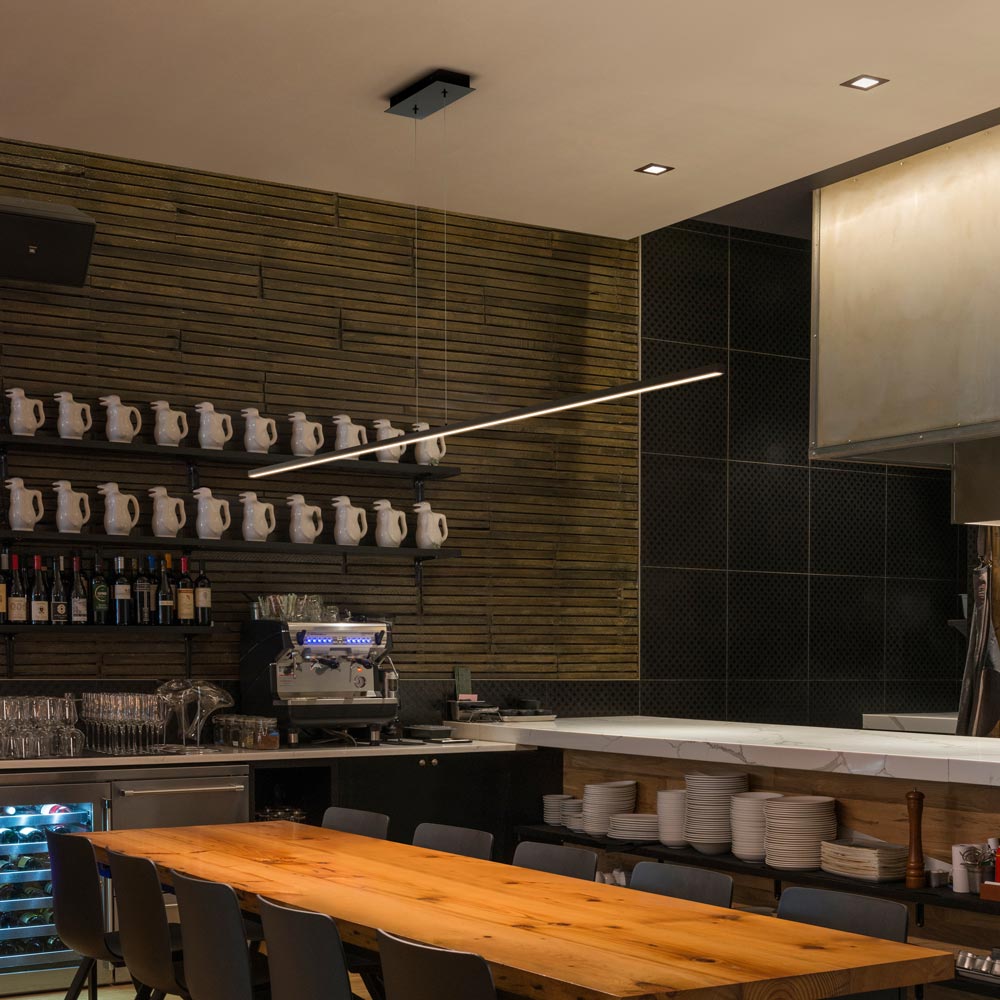 Cirrus LED Linear Pendant Light in dining room.