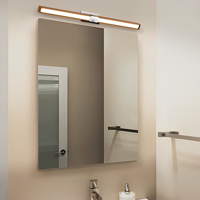 Tie Stix 2-Light Adjustable 24-Inch LED Vanity Wall Light with Remote Power in bathroom.