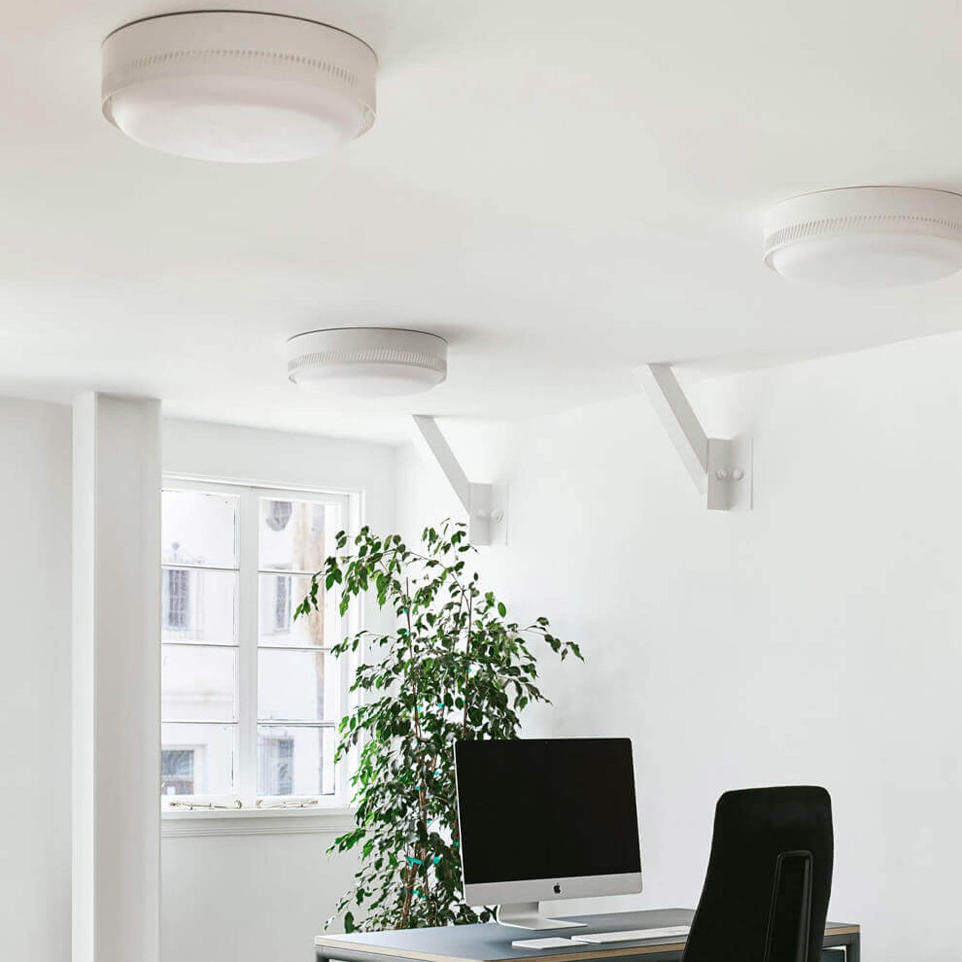 Centro LED Flush Mount Ceiling Light in office.