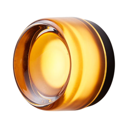 Dimple LED Wall Light in Amber/Black Anodized.