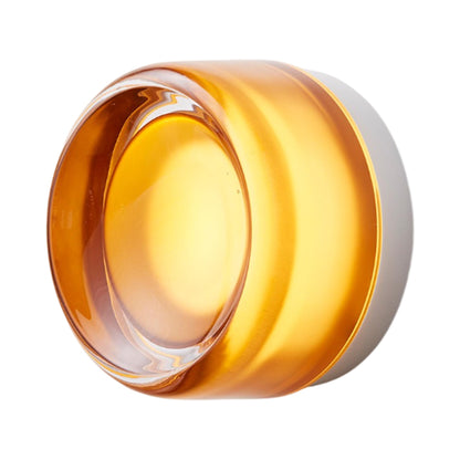 Dimple LED Wall Light in Amber/Natural Anodized.