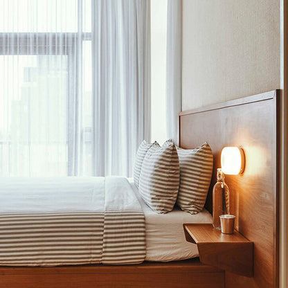 Dimple LED Wall Light in bedroom.