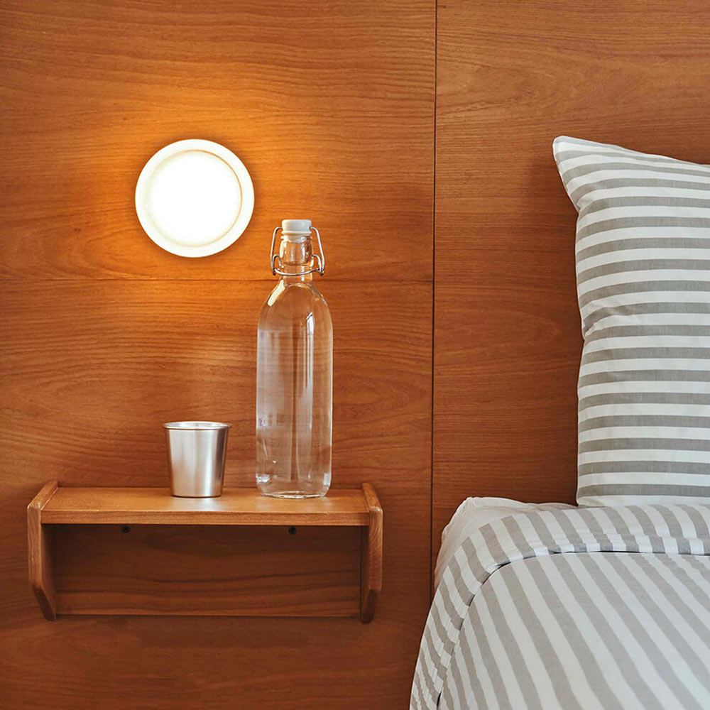 Dimple LED Wall Light in bedroom.