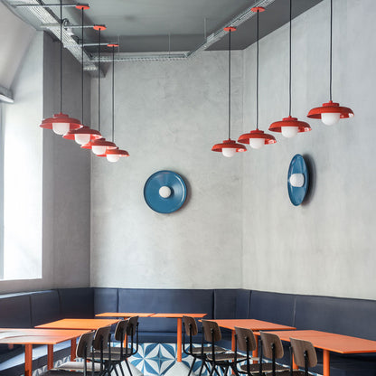 Hoist Shade LED Pendant Light in restaurant.