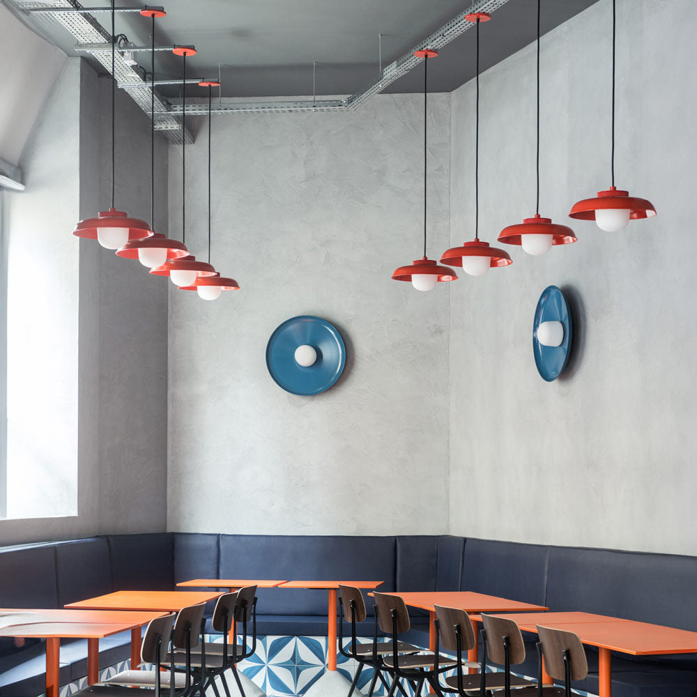 Hoist Shade LED Wall Light in restaurant.