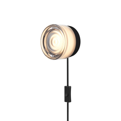 Ripple LED Plug-in Wall Light in Smoked/Black Anodized.