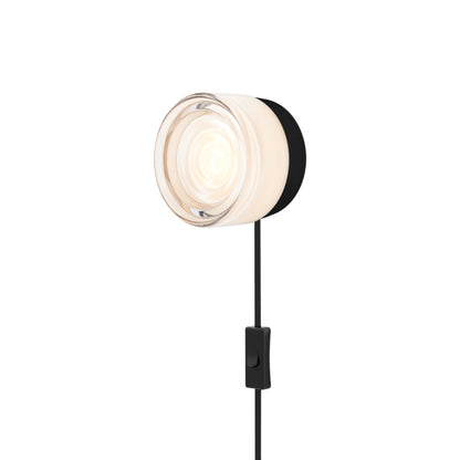 Ripple LED Plug-in Wall Light in White Interior/Black Anodized.