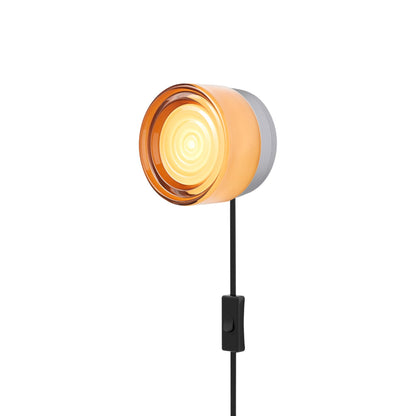 Ripple LED Plug-in Wall Light in Copper Exterior/Natural Anodized.