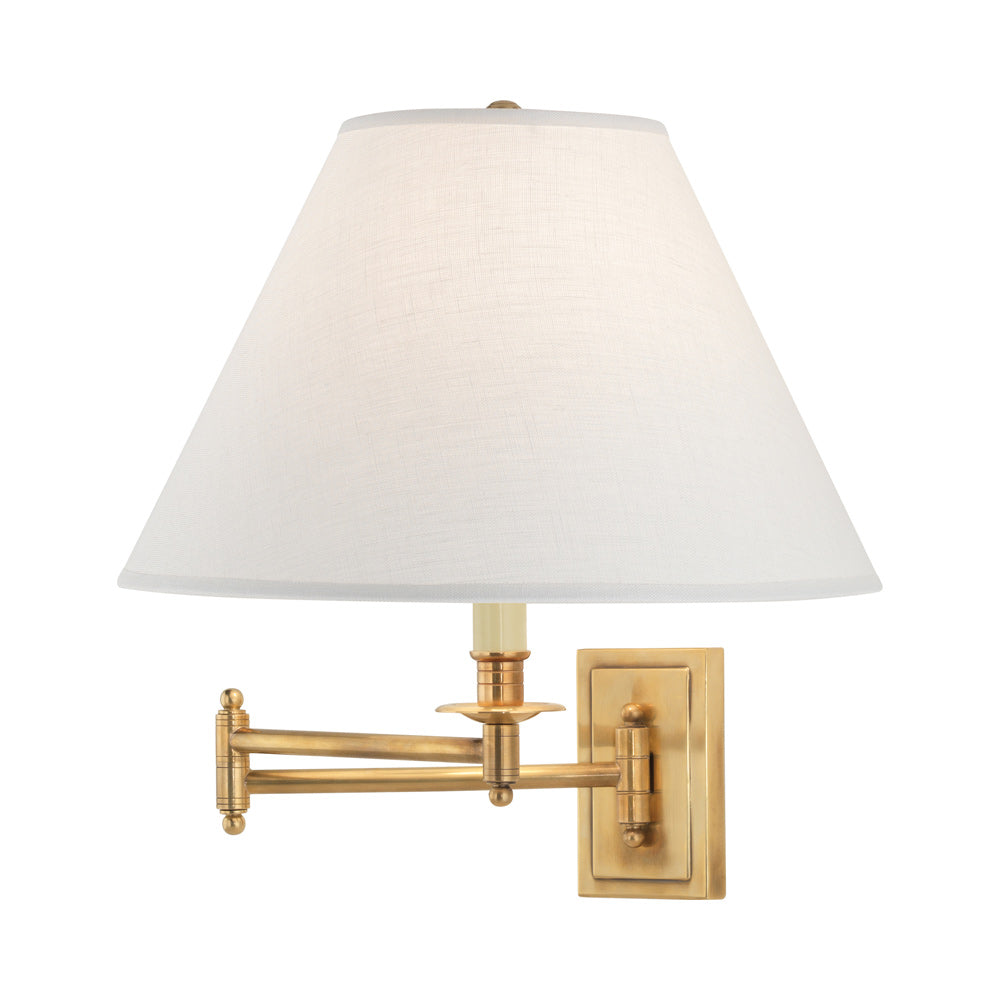 Kinetic Swing Arm Wall Light in Antique Brass/Oyster Linen.