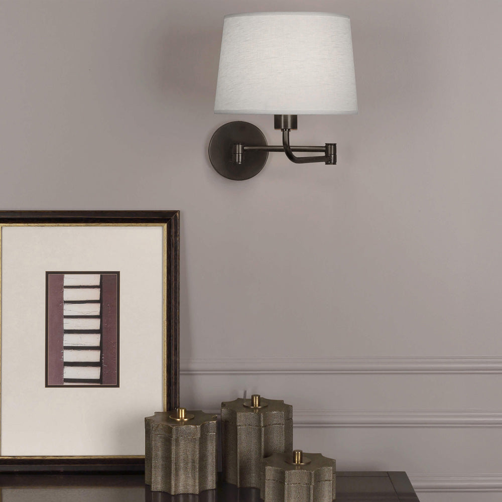 Koleman Swing Arm Wall Light in living room.