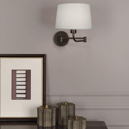 Koleman Swing Arm Wall Light in living room.