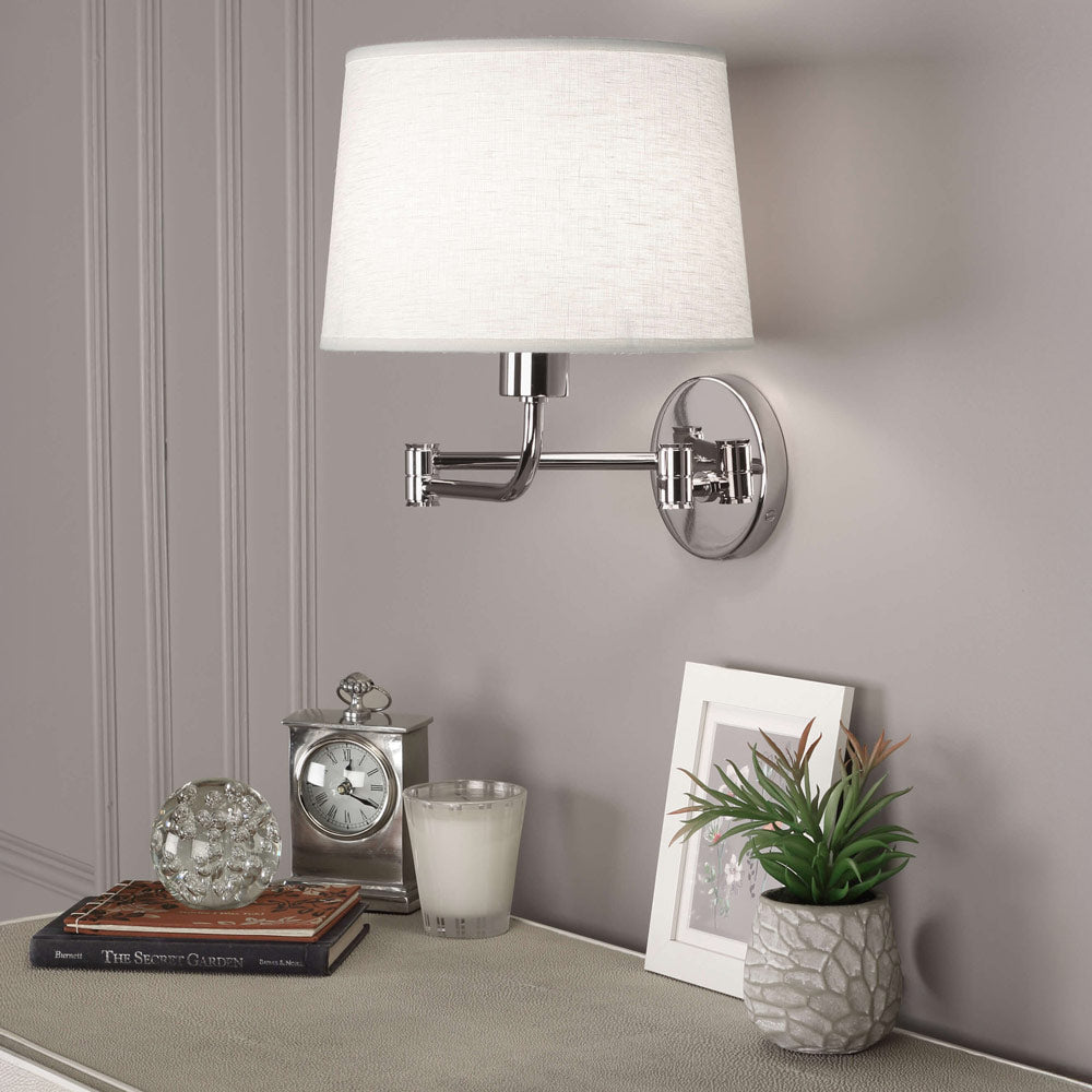 Koleman Swing Arm Wall Light in living room.