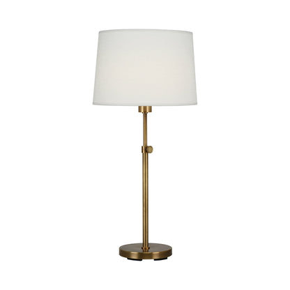 Koleman Table Lamp in Aged Brass.