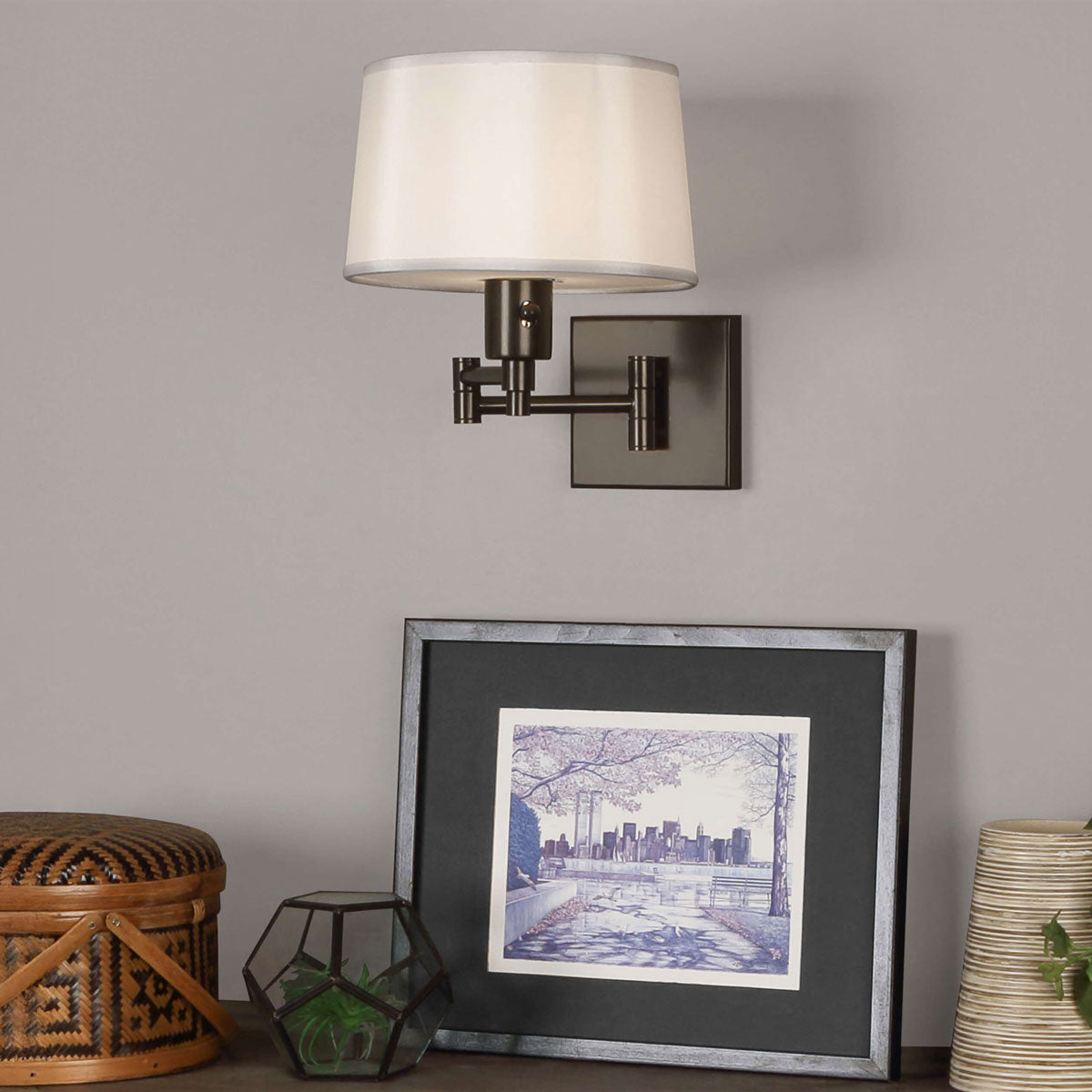 Real Simple Swing Arm Wall Light in living room .