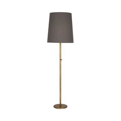 Rico Espinet Buster Floor Lamp in Aged Brass/Smoked Gray.