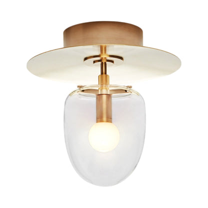 Bell LED Flush Mount Ceiling Light in Brass/Clear.