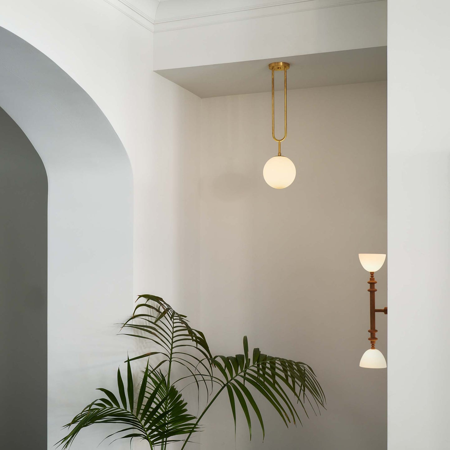 Del Playa Double Arm LED Wall Light in living room.