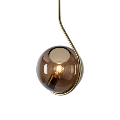 Fiddlehead Pendant Light in Brushed Brass/Smoke.
