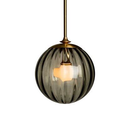 The Roll and Hill Globe LED Pendant Light in Brass/Fume Glass with Ripple Texture.