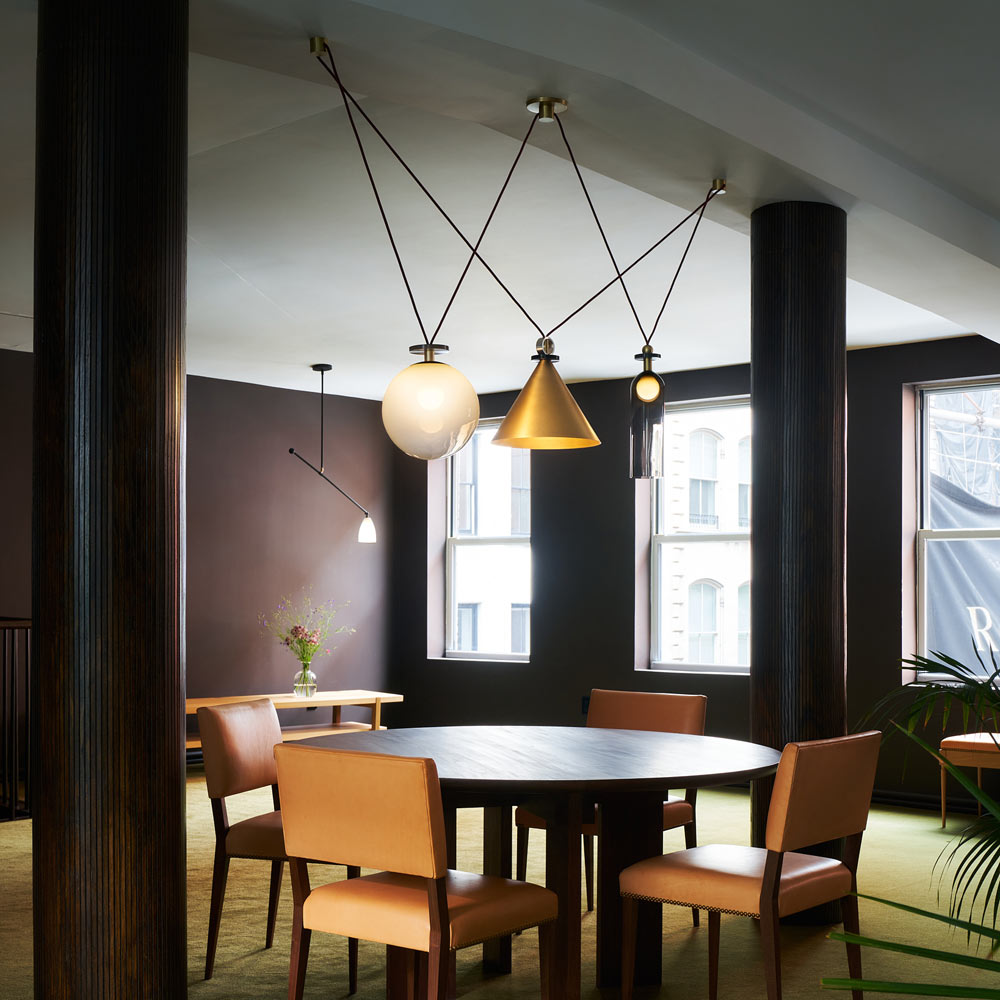 Shape Up Multi-light Pendant Light in living room.