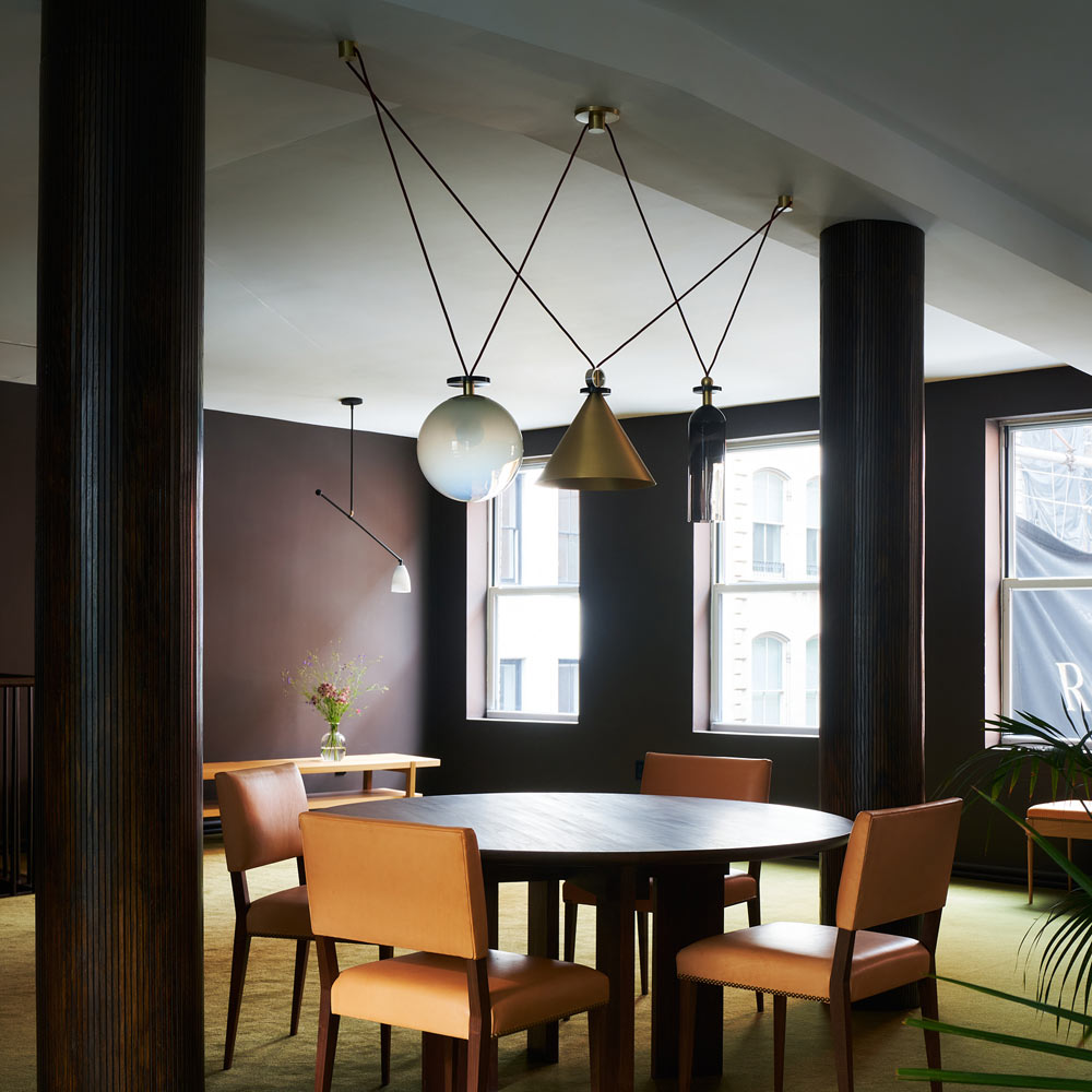 Shape Up Multi-light Pendant Light in living room.