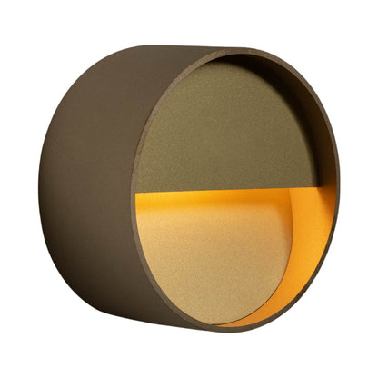Tobor LED Wall Light in Sandblasted Unlacquered Brass.