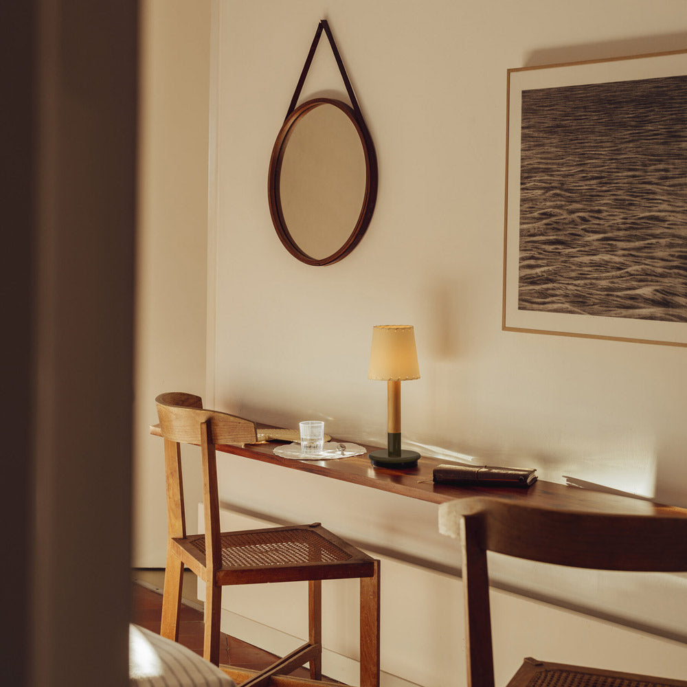 Básica Mini LED Rechargeable Table Lamp in dining room.