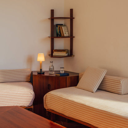 Básica Mini LED Rechargeable Table Lamp in living room.