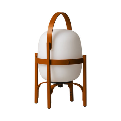 Cestita Outdoor LED Rechargeable Table Lamp in Reddish Orange.
