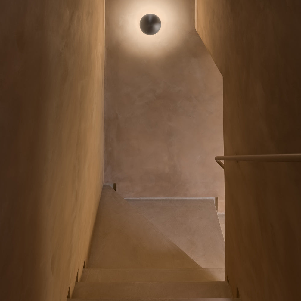 Disco Wall Light in stairway.