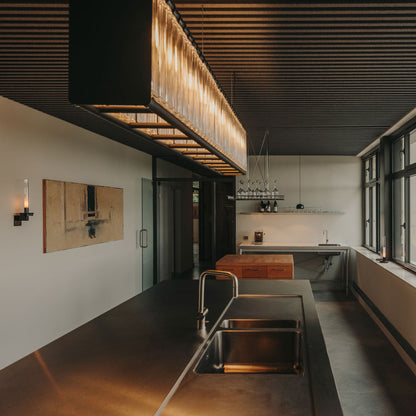 Estadio Linear Pendant Light in breakroom.