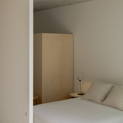 Gira Table Lamp in bedroom.