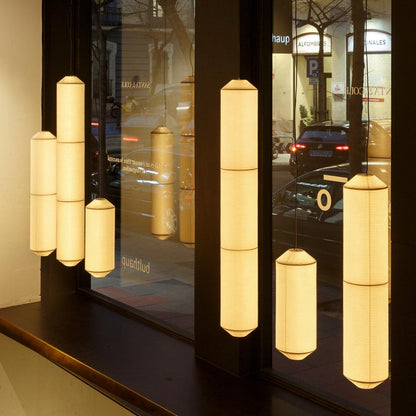 Tekiò Vertical LED Pendant Light in store.