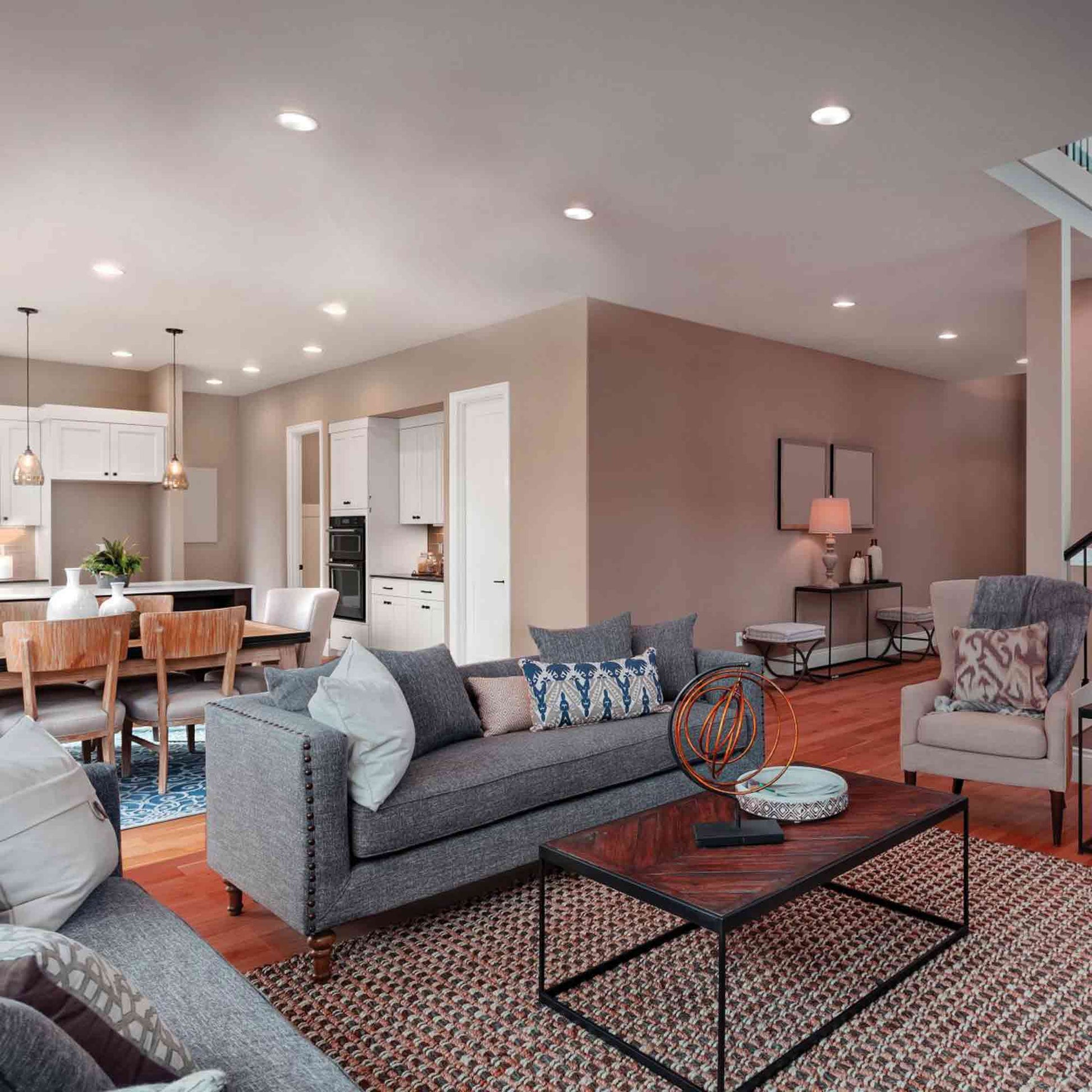 Starfish S11283 - 6 Watts R20 Wifi Smart LED Color-Changing Light Bulb in living room.