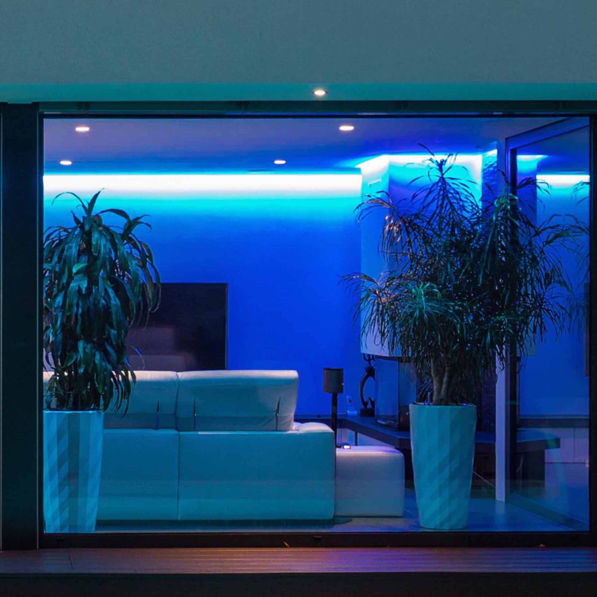 Starfish Wifi Smart LED Color-Changing 4 Inch Recessed Downlight in living room.