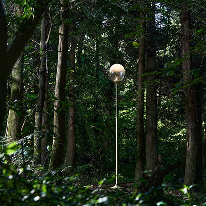 Mist LED Floor Lamp in Outside Area.