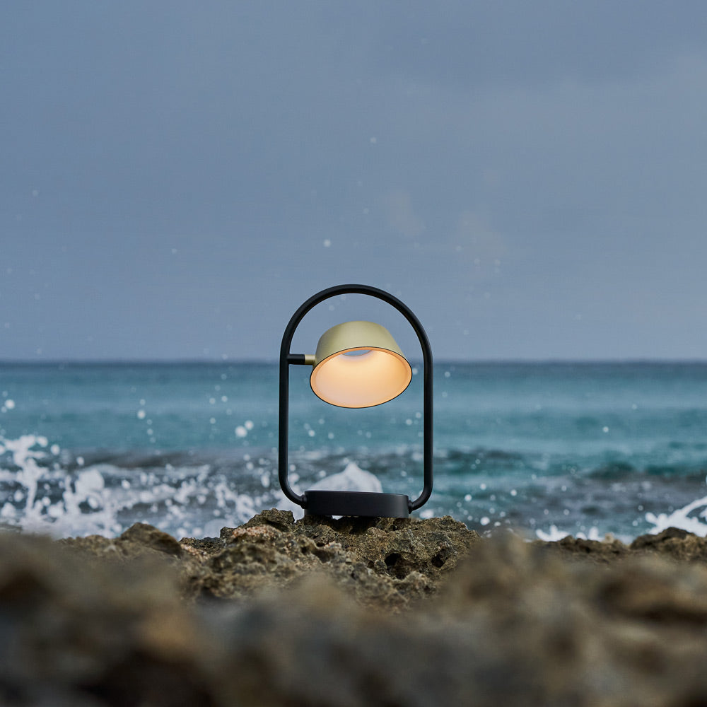 Olo Rechargeable LED Table Lamp in Outside Area.