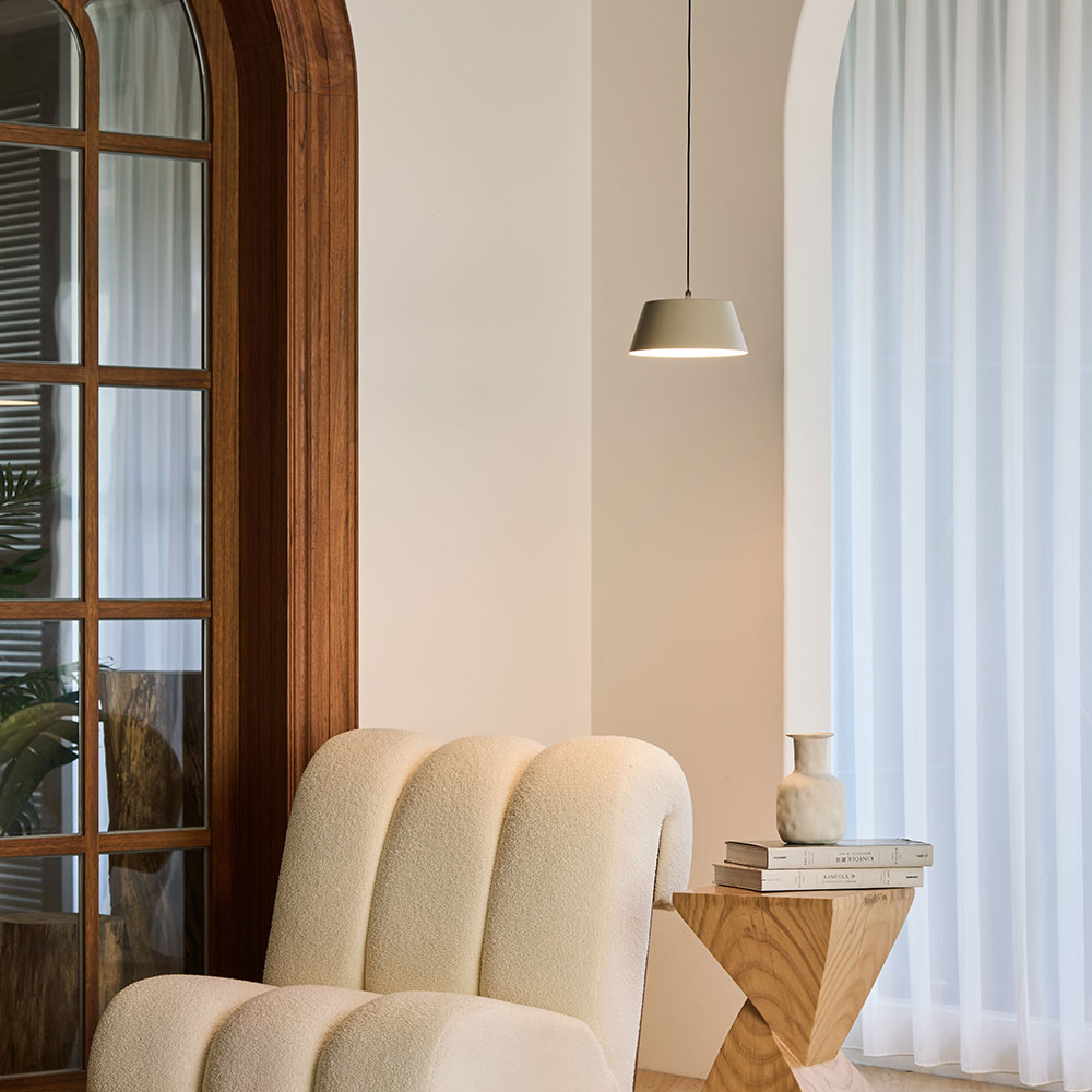 Olo Single LED Pendant Light in living room.