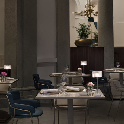 Accordeon Battery LED Table Lamp in restaurant.