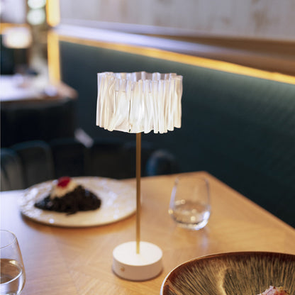 Accordeon Battery LED Table Lamp in restaurant.