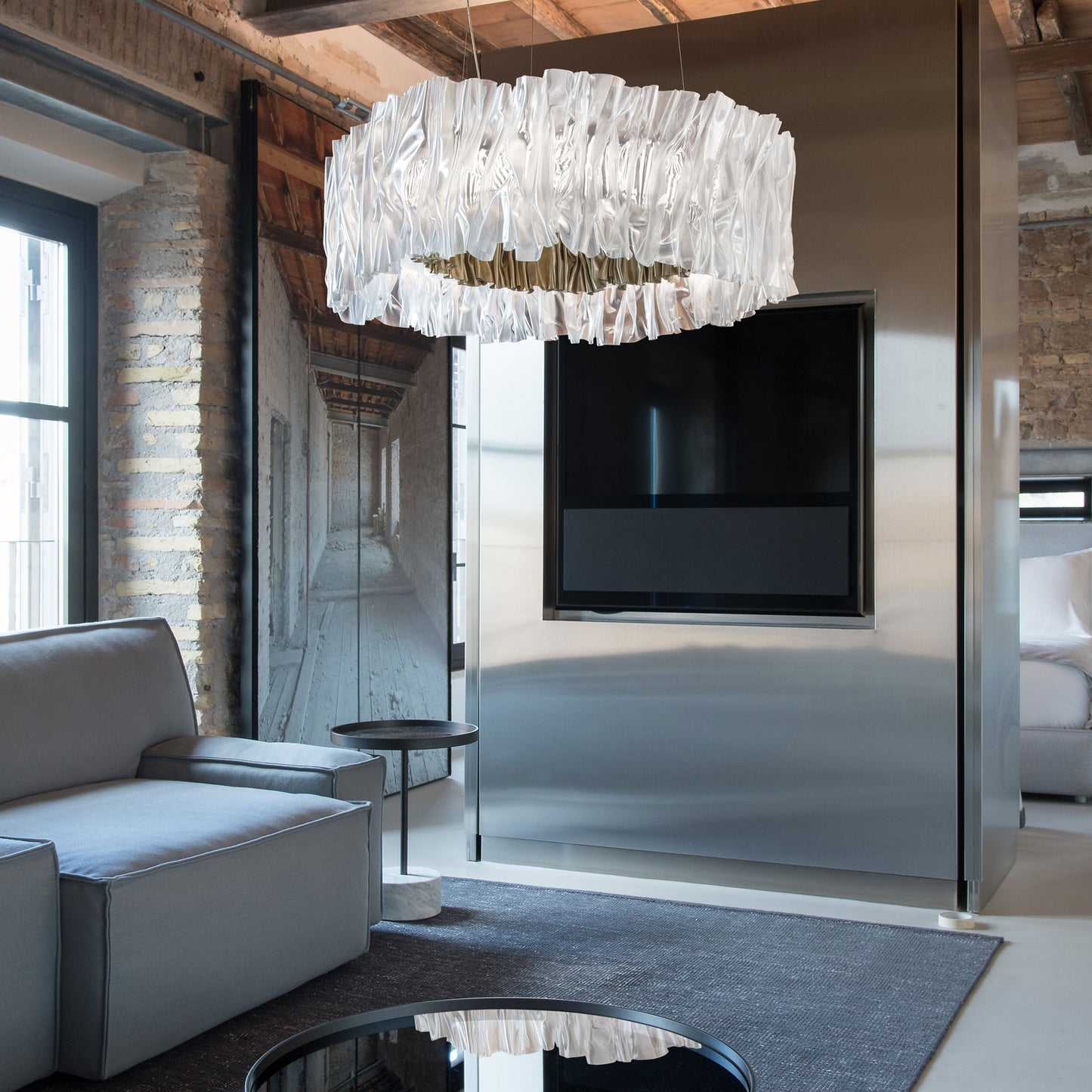 Accordeon LED Chandelier in living room.