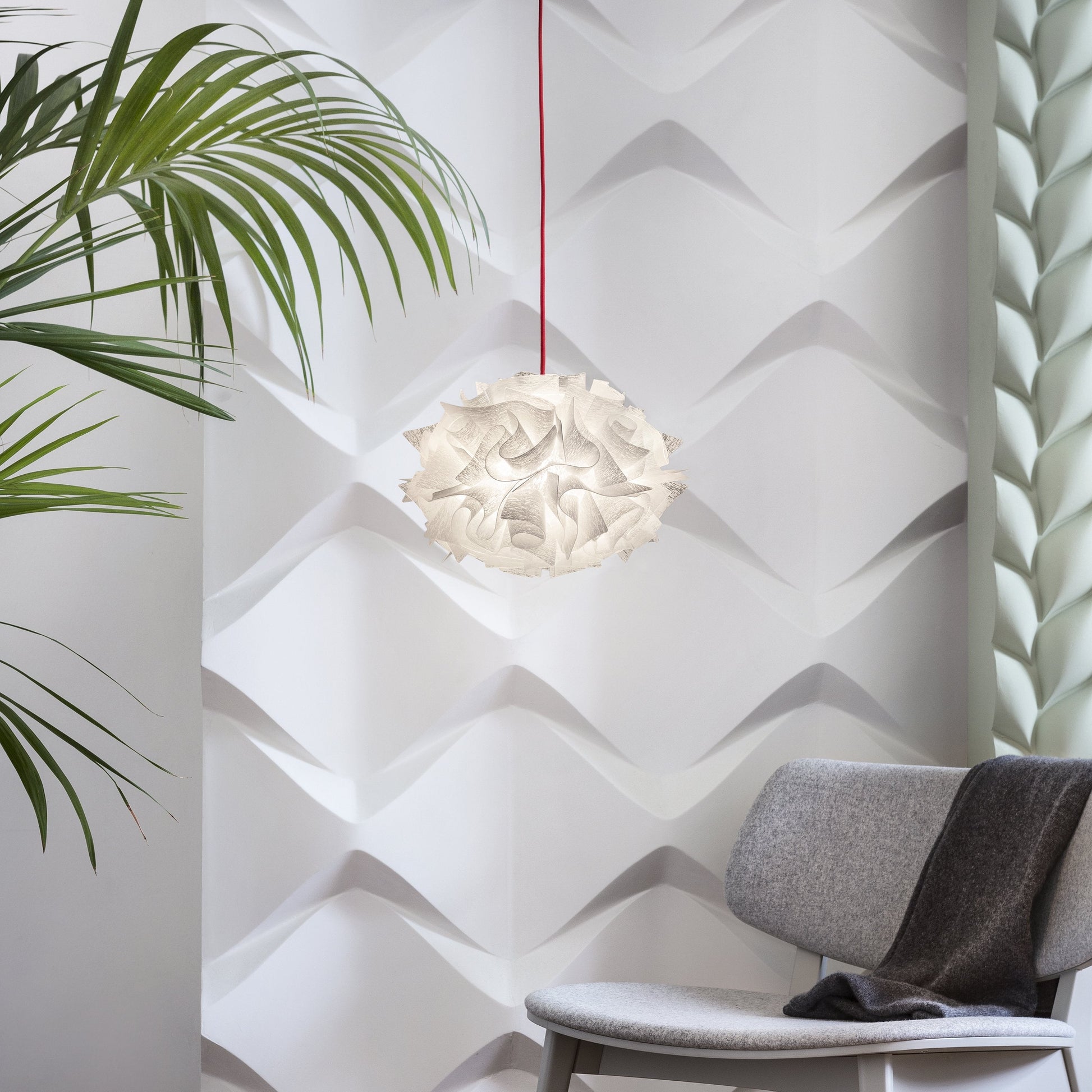 Veli Mini Single Couture Pendant Light in living room.