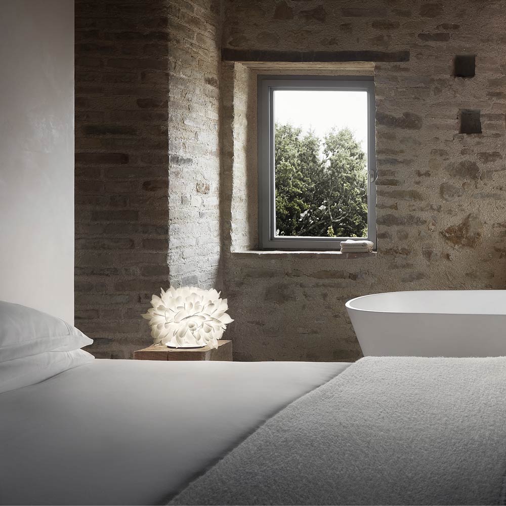 Veli Table Lamp in bedroom.