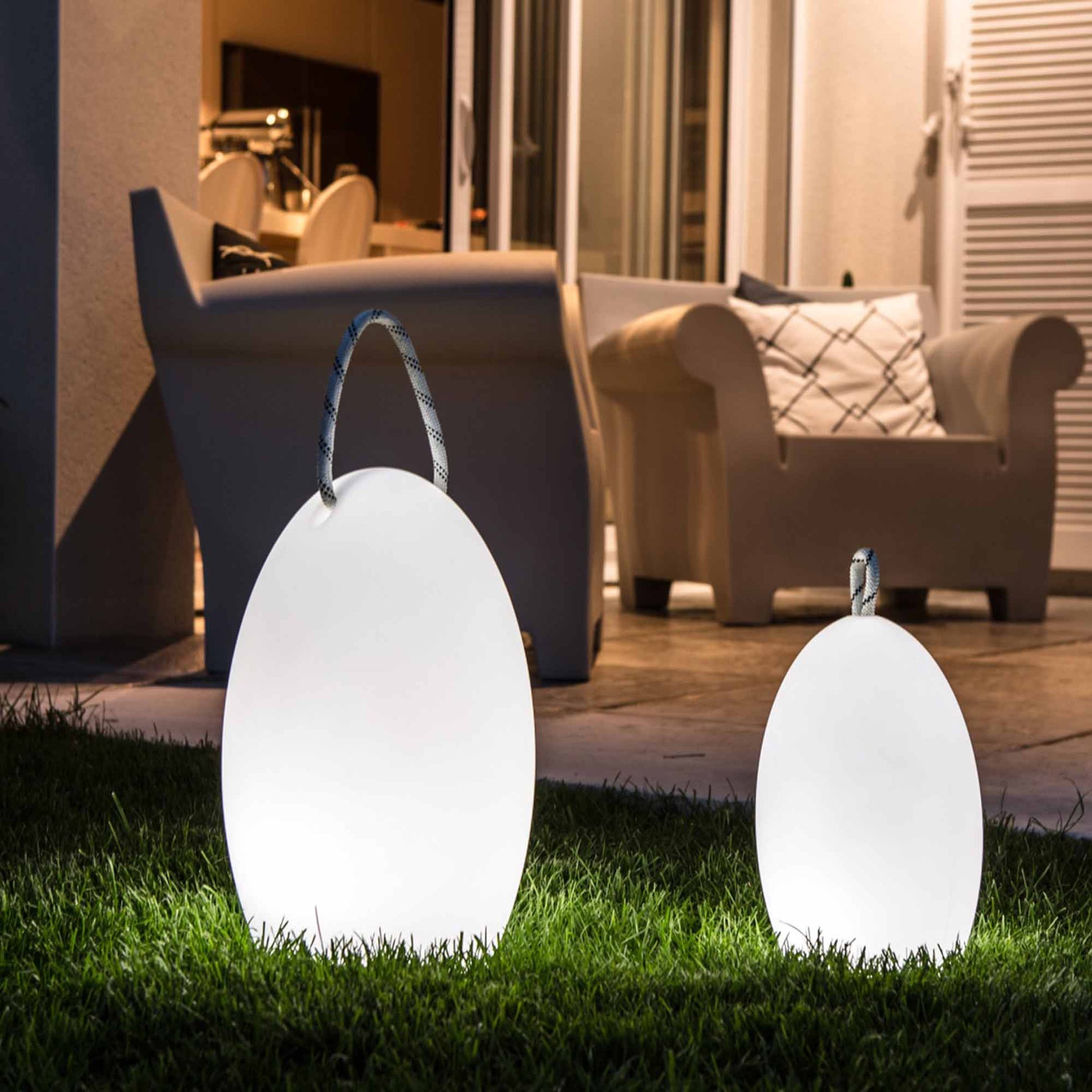 Amanda Corde Bluetooth Outdoor LED Table Lamp in Outside Area.