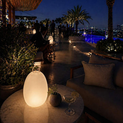 Amanda Corde Bluetooth Outdoor LED Table Lamp in Outside Area.