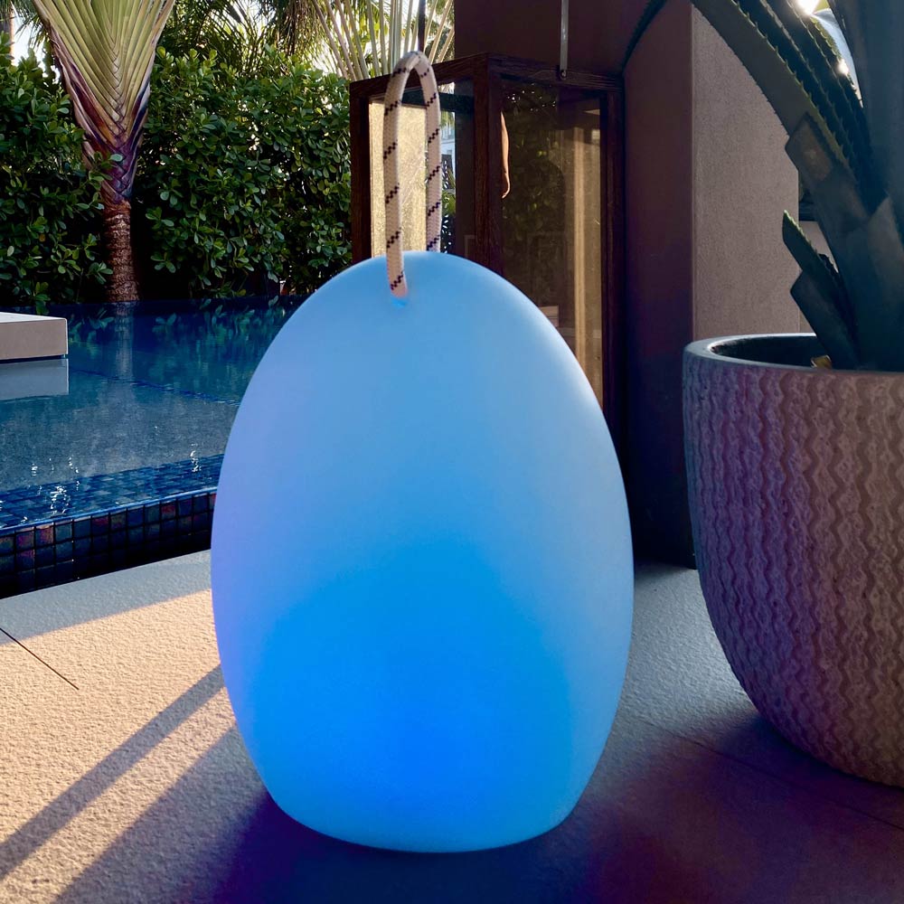 Amanda Corde Bluetooth Outdoor LED Table Lamp in Outside Area.