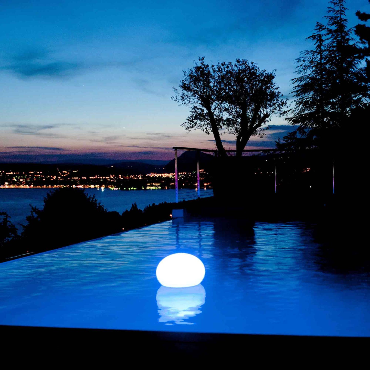 Flatball Floating Bluetooth Outdoor LED Lamp in Outside Area.