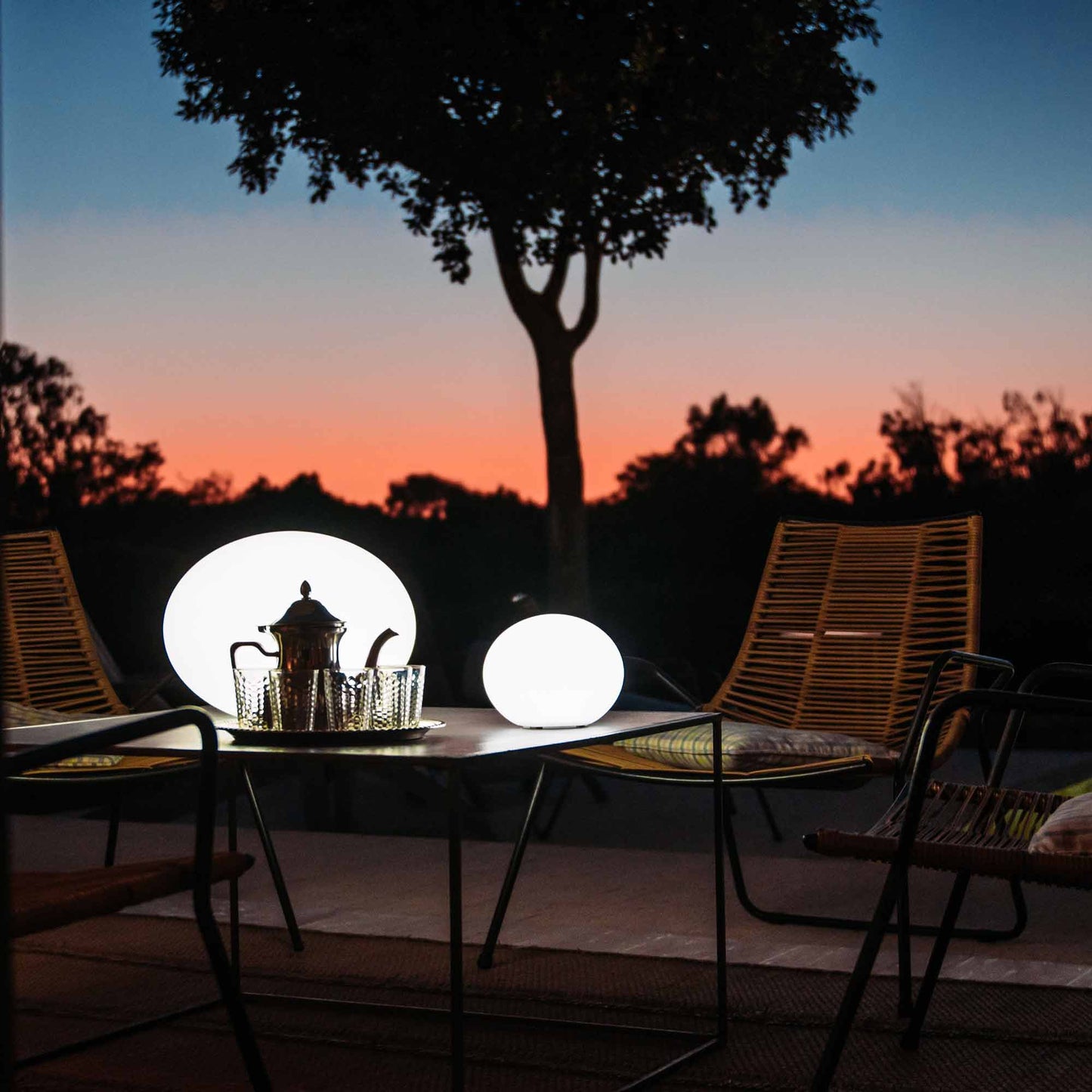 Flatball Floating Bluetooth Outdoor LED Lamp in Outside Area.